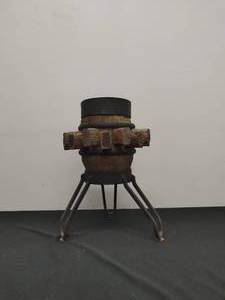 lot 10 image: Old Wagon Wheel Hub with Metal Base