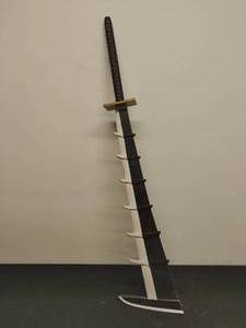 lot 23 image: Wooden Cosplay Sword with Black Handle
