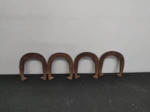 lot 26 image: Four Vintage Horseshoes
