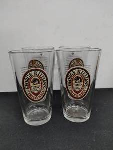 lot 33 image: Four George Killians Irish Red Pint Glasses