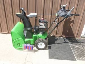 lot 5 image: Lawn Boy 24 Snow blower. 5 hp with electric start. Lightly used. Good overall condition. Tested & works. As shown.