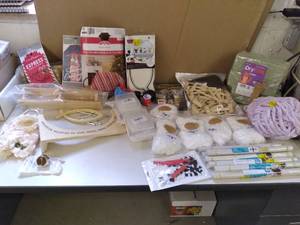 lot 57 image: Craft Lot Yarn, Thread, Bike Bag, Desert Dry Foam Open Packaging , DJDZ Direct Elastic String for Mask Making, Artificial Flowers, Packing Paper Rolls, Ryans World Bike Horn, Fastlane 2021 DVD, Expandable Accordion Hangers