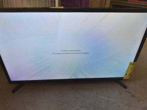 lot 58 image: Samsung 32 Television Powers On, has Scratching on Lower Right Corner of Screen See Photos