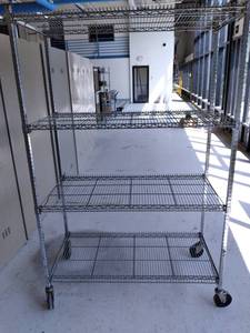 lot 15 image: Large Wire Shelving Rack on Wheels ...