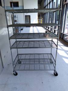 lot 17 image: Heavy Duty Wire Shelving Unit on Wh...