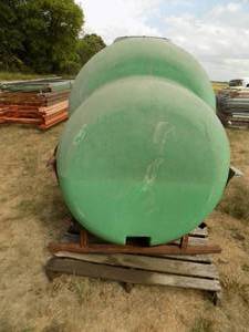 lot 14 image: 200 gallon Green Poly Tank and Stand & Valve