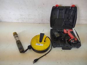 lot 40 image: Skil 12 Volt Drill, Bayco Retractab...