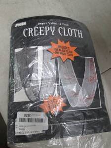 lot 140 image: creepy cloth open box ...