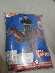 lot 200 image: puff me up ride a raptor child 7-10...