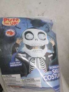 lot 310 image: puff me up bobblehead skull costume...