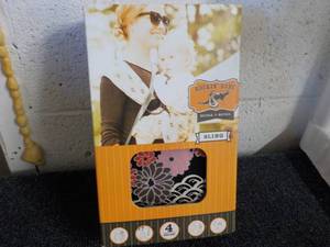 lot 208 image: Rockin Baby Over the Mountain Slin...