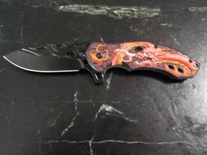 lot 108 image: Dragon Pocket Knife...