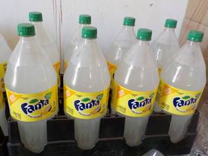 lot 341 image: 8 - 2 liter Bottles Fanta Pina Cola...
