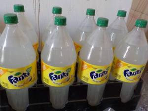 lot 342 image: 8 - 2 liter Bottles Fanta Pina Cola...