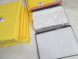 lot 247 image: 6 Pink Bluetooth Keyboard Cases...