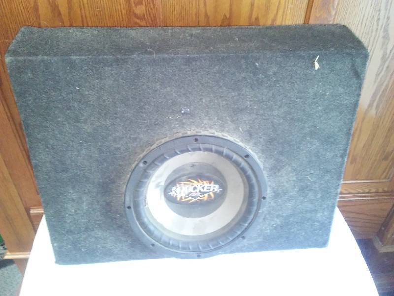 lot 190 image: Kicker Subwoofer, car stereo, toy airplanes.
