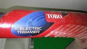 lot 145 image: Toro Electric plugin grass trimmer