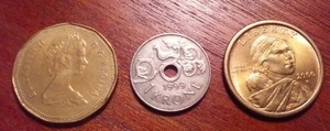 lot 185E image: Coin Variety. 1987 Canada $1.00, 1999 Norway $1.00 Kroner, 2000 Sacagawea US $1.00.