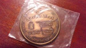 lot 325D image: Nordic Fest Commemorative Coin in factory wrapping.