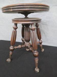 lot 2 image: ANTIQUE CLAW  GLASS BALL  FOOT STOOL