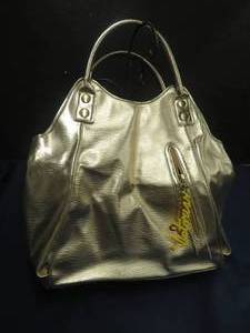 lot 62 image: NEW VICTORIAS SECRET GOLD PURSE