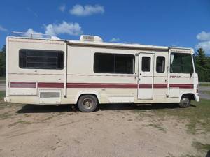 lot 0A image: 1990 FORD M-26R FLEETWOOD FLAIR RV