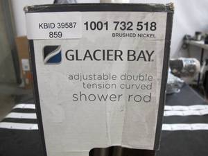 lot 859 image: Glacier Bay Rustproof 50 in. to 72 in. Aluminum Adjustable Tension Double Curved Shower Rod in Brushed Nickel