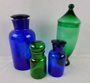lot 57 image: Stunning Vintage Colored Glass Apothecary Jars and Porcelain Bowl Collection