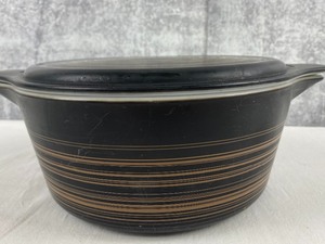 lot 13 image: Awesome Vintage Covered Pyrex Dish in Black and Gold Spiral- Terra 403
