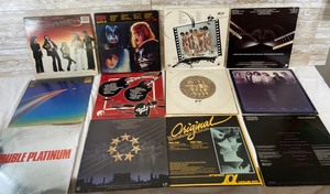lot 270 image: 12 Vintage Records- Kiss, Journey, ZZ Top & More