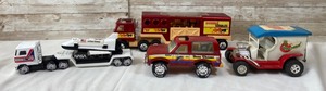 lot 306 image: 4 Vintage Toy Trucks- Buddy L Stables, Tonka Apple Peeler, Nylint Bass Chaser & Buddy L Nasa