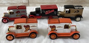 lot 307 image: 5 Vintage Ertl Die Cast Sports Team Banks- Falcons, Bengals & Buffaloes