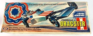 lot 255 image: Two Vintage Evel Knievel Gyro-Powered Motorcycle Sets w Figures in Orig. Box, Plus Chopper