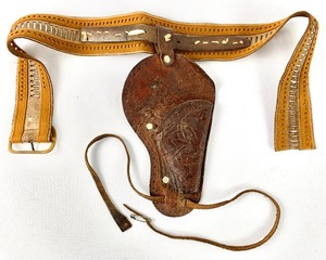lot 262 image: Vintage 1960s Tooled Leather Toy Gun HolsterBelt and Plastic ArmyCowboyNative Men