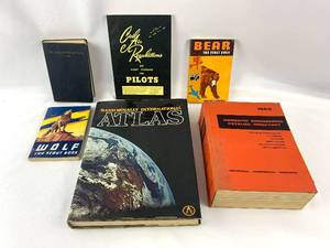 lot 149 image: A Variety of Vintage Informational Books icluding a 1940s Bluejackets Manuel, Boy Scouts of America books, Pilot Manuel and Rand McNally Atlas