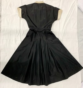 lot 281 image: Iconic Vintage 1950s A-Line Black Dress w Pleated Skirt and Polka Dot Collar, Size 7- Vicky Vaughn