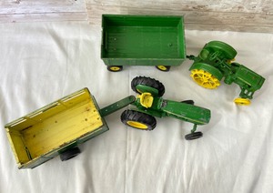 lot 311 image: Pair Vintage Ertl Die Cast John Deere Tractors w Trailers