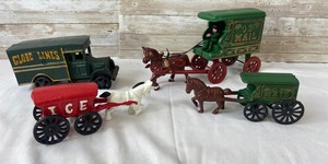 lot 317 image: 4 Vintage Cast Iron Replicas- Us Mail, Globe Lines, Ice- Horse & Buggy