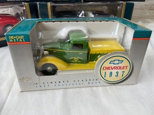 lot 324 image: 6 Vintage Die Cast Model Trucks Cars & Banks In Original Boxes- Chevrolet, John Deere, Ertl
