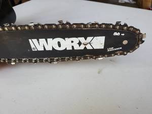 lot 41 image: WORX Electric Chain Saw  Tree Trimmer