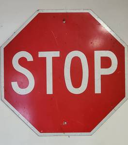 lot 30 image: Garage Decor Stop Sign, Fan Blade and Steering Wheel