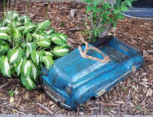 lot 64 image: Vintage Rusted Peddle Car Garden Decor