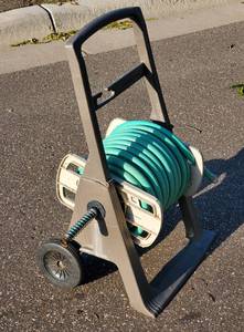 lot 72 image: Garden Hose and Reel
