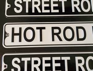 lot 81 image: (3) Metal Garage Decor Signs