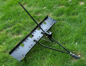 lot 135 image: Pull Behind Riding Lawn Mower Thatcher Attachment