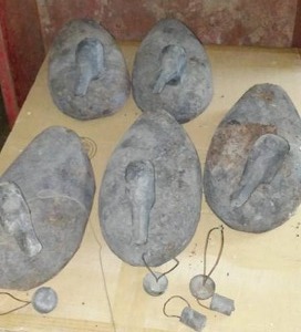 lot 25 image: (5) Vintage cork duck decoys and weights