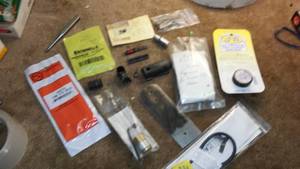 lot 80 image: Misc. Gun Parts, lock and J - B compound.