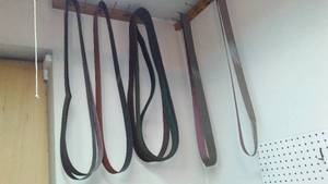 lot 118 image: Sanding Belts.  About a dozen, fit Lot 92, most are new. approx. 72  belts.