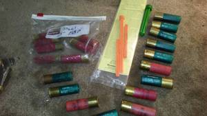 lot 189 image: 12 ga slugs, BB shot, magazine plugs.