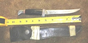 lot 208 image: Knife & leather sheath